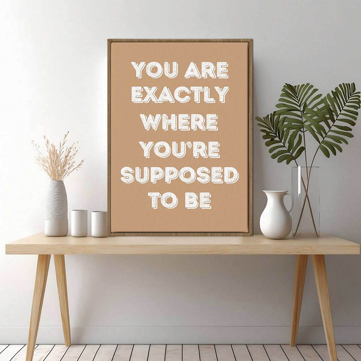 light oak color frame motivational poster canvas print on the table