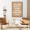 light oak color frame motivational poster canvas print hanging on the wall