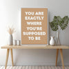 white frame motivational poster canvas print on the table