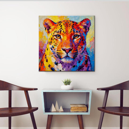living room wall art canvas painting depicts a vibrantly colored leopard.