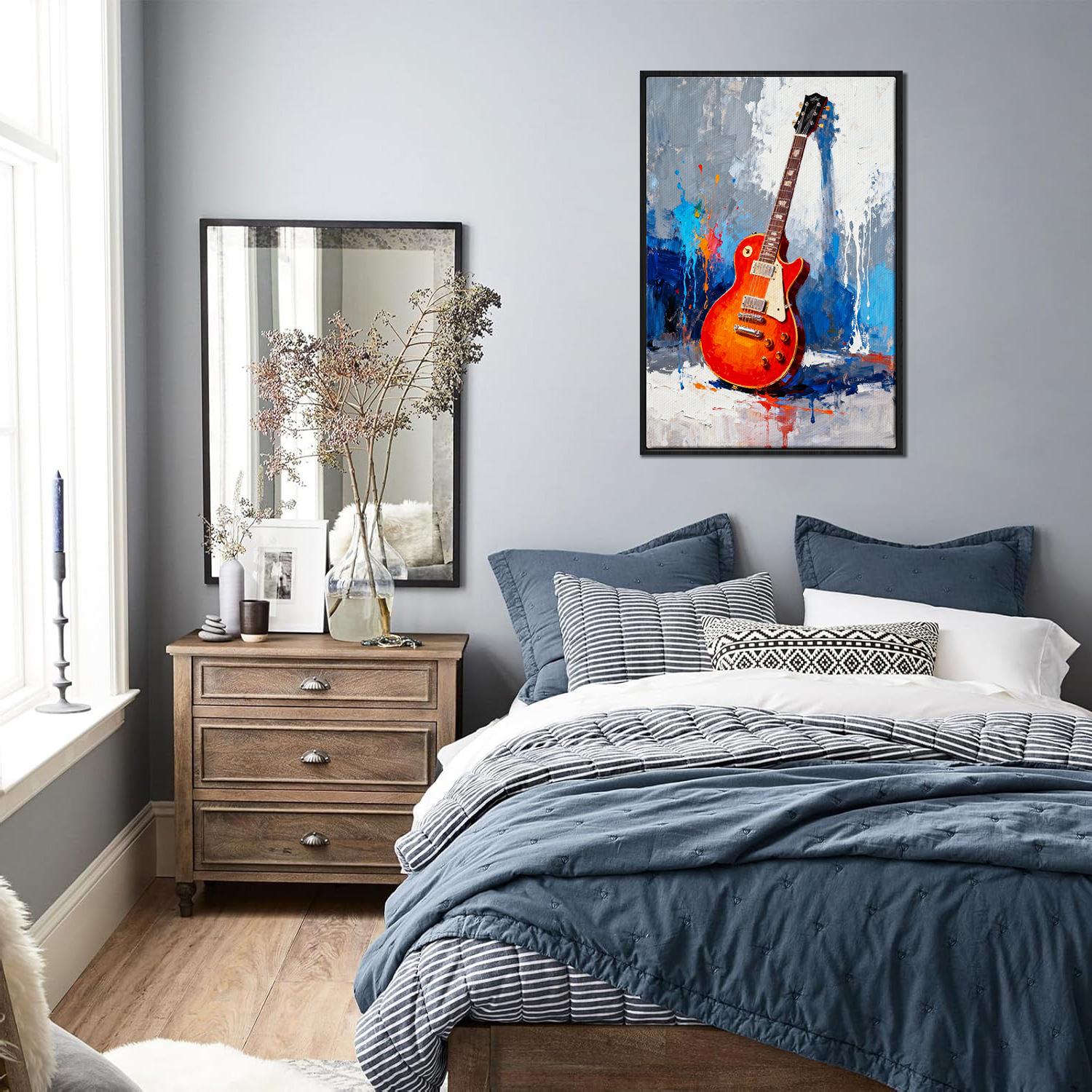 black frame art canvas painting showing a colorful electric guitar