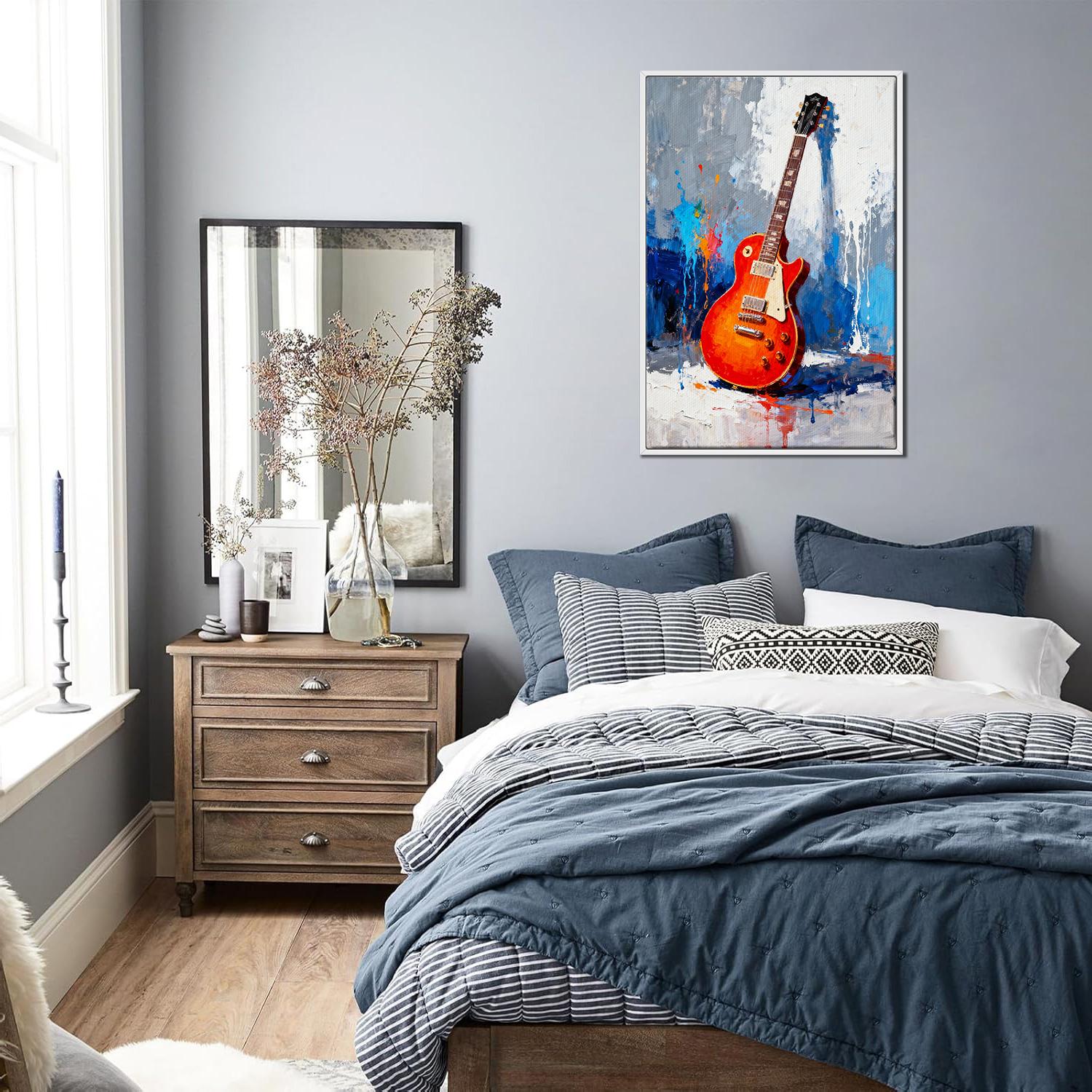 white frame art canvas painting showing a colorful electric guitar