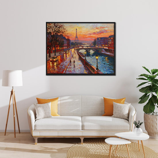 black frame wall art painting depicting the beautiful sunset scenery of the Seine River in Paris hangs on the wall of the living room