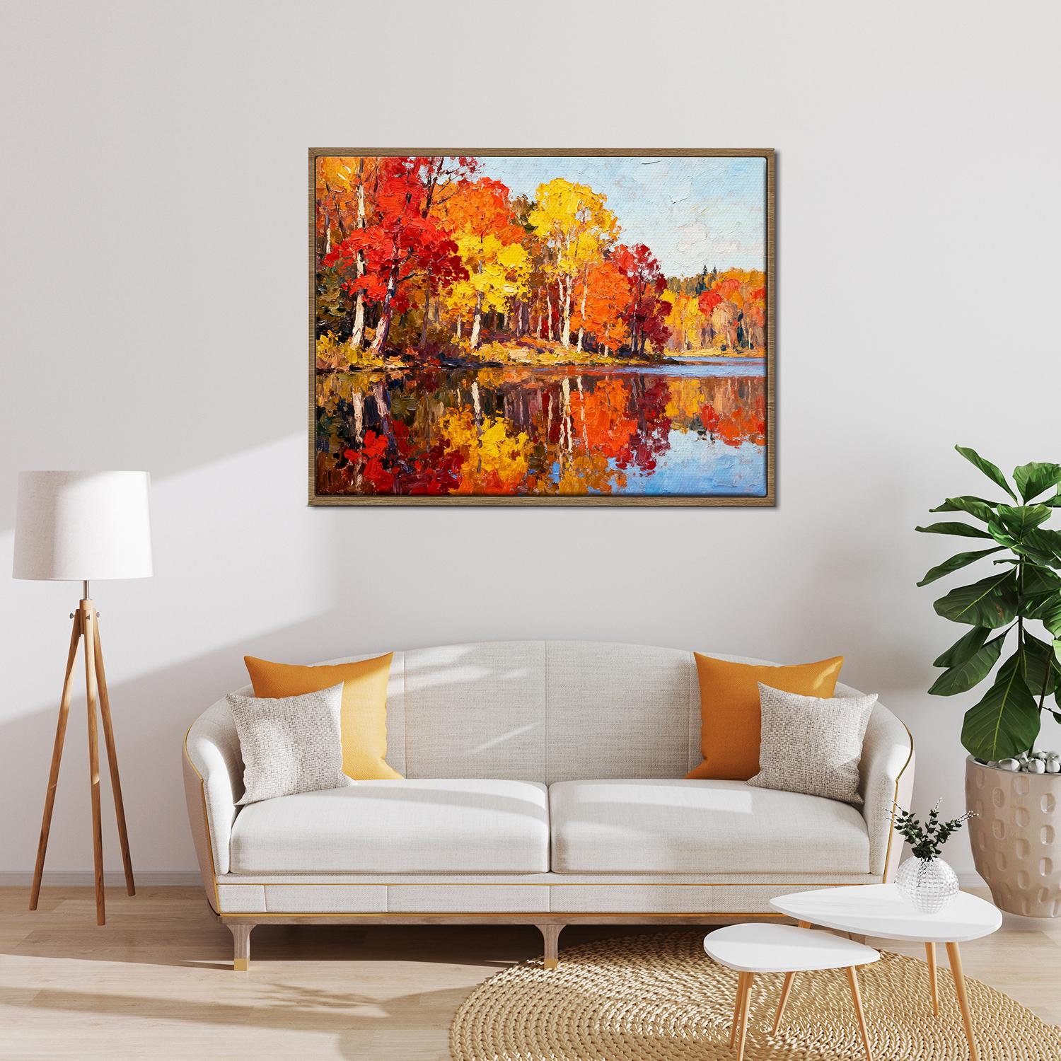 light oak color frame wall art painting of an autumn lakeside hangs on a simple and bright interior wall