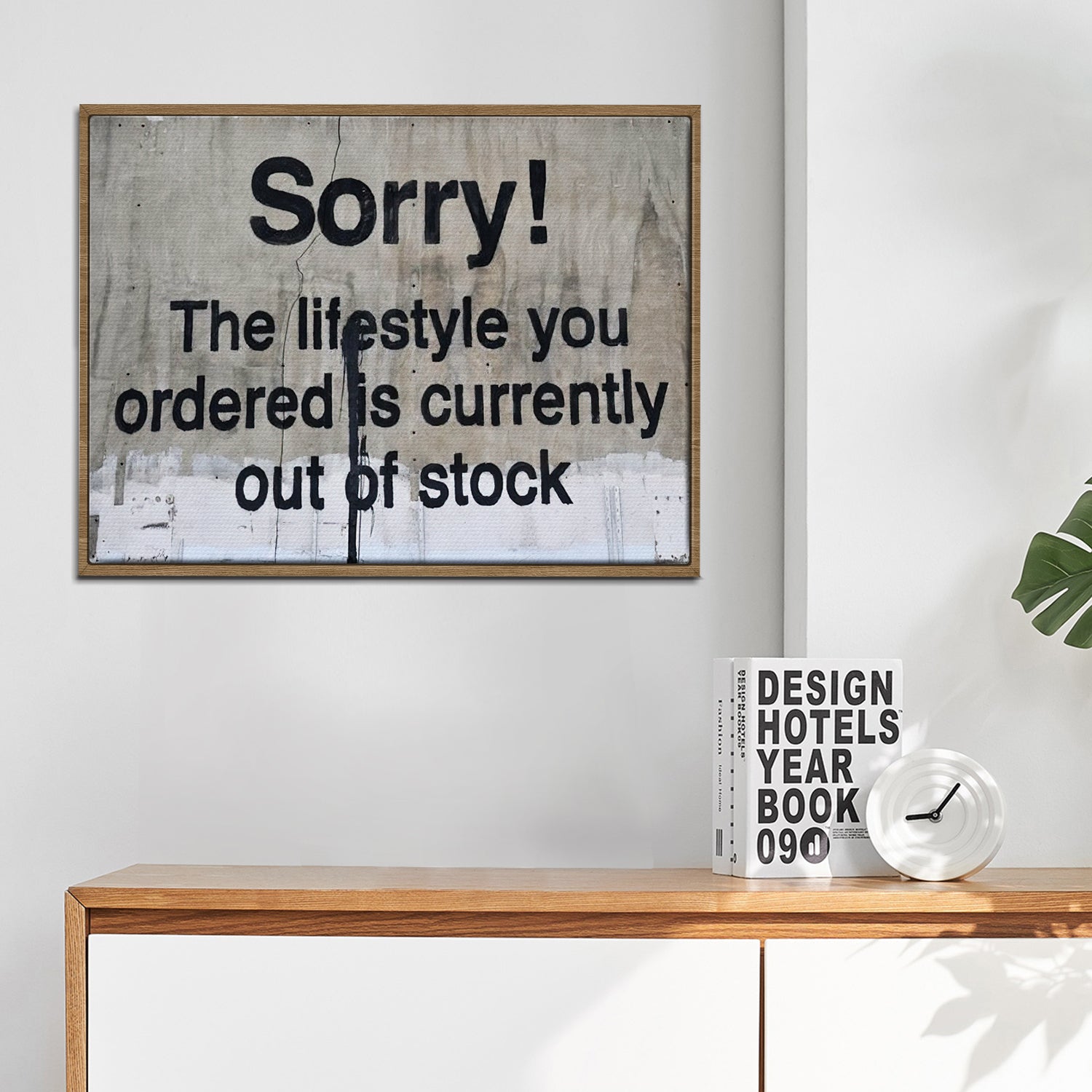 light oak color frame banksys statement canvas print in the living room