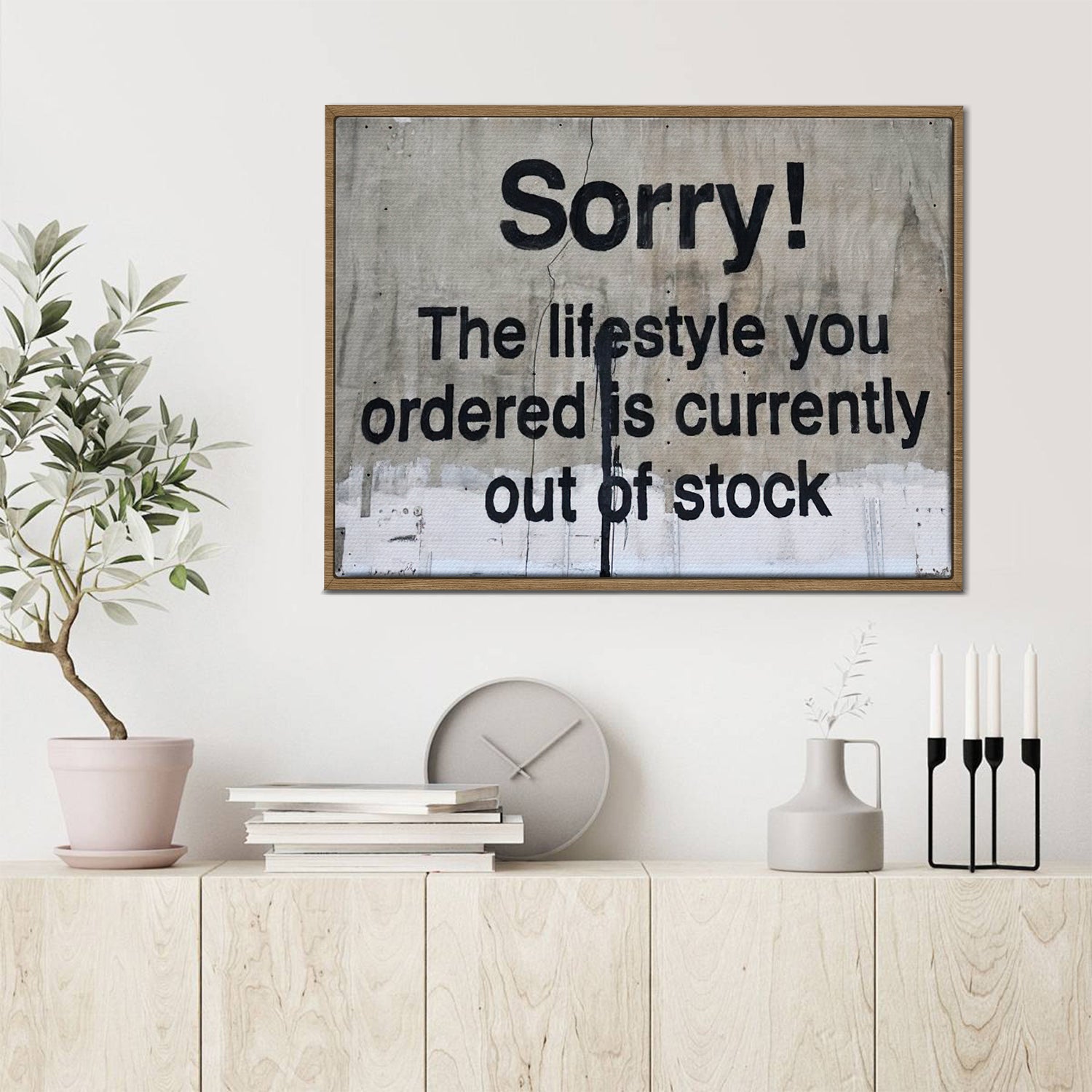 light oak color frame banksys statement canvas print in the living room