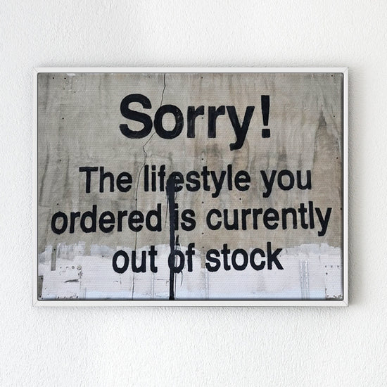 white frame banksys statement canvas print