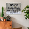 white frame banksys statement canvas print hanging on the wall