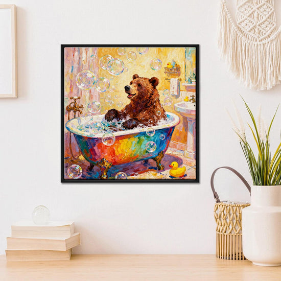 black frame wall art canvas in the children room depicts a brown bear taking a bath in a colorful bathtub
