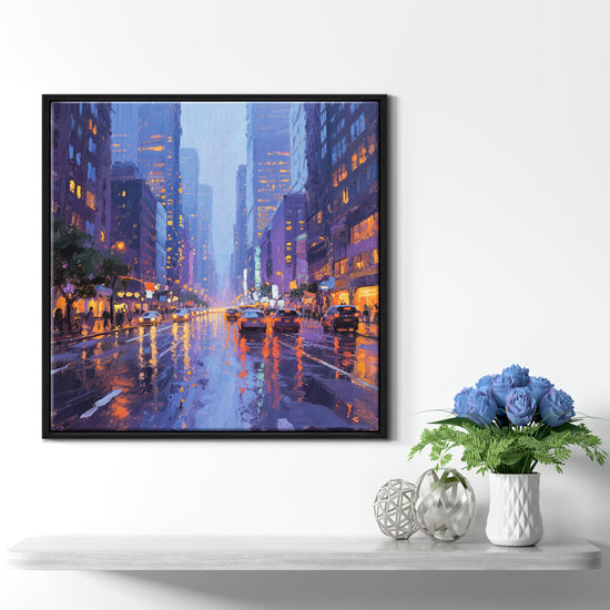 a black frame wall art painting showing the bustling city streets on a rainy night hangs on the wall of a warmly decorated room