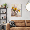 wall art canvas inthe living room  depicts two vases filled with colorful flowers