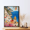 black frame seaside town scenery wall art painting on the table