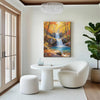 wall art canvas painting hang on the wall depicting the beauty of a waterfall flowing through a colorful forest in autumn.