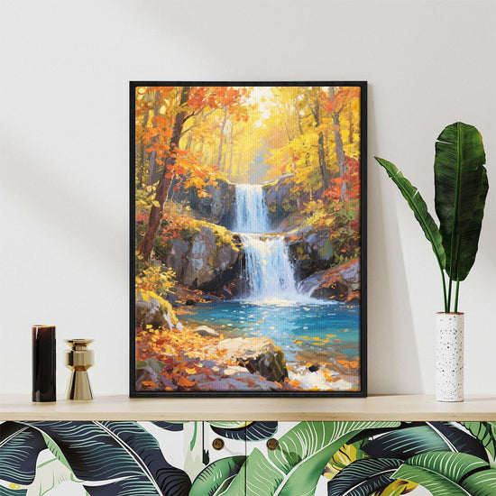 black frame canvas wall art canvas painting depicting the beauty of a waterfall flowing through a colorful forest in autumn.