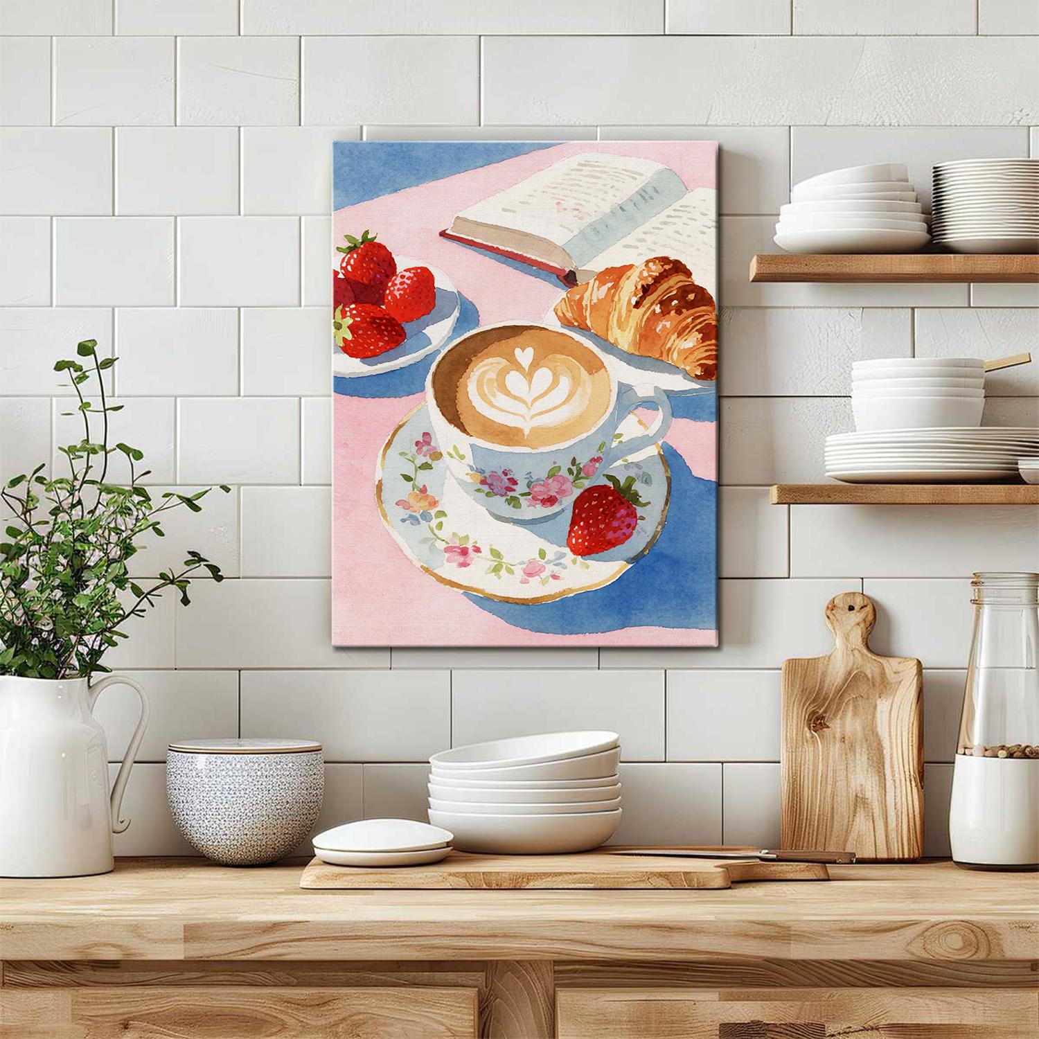 wall art canvas painting in the kitchen depicts a cozy scene with latte art coffee, strawberries, croissants and an open book.