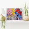 wall art painting on the table depicting colorful forest