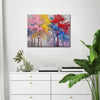 wall art painting above the table depicting colorful forest