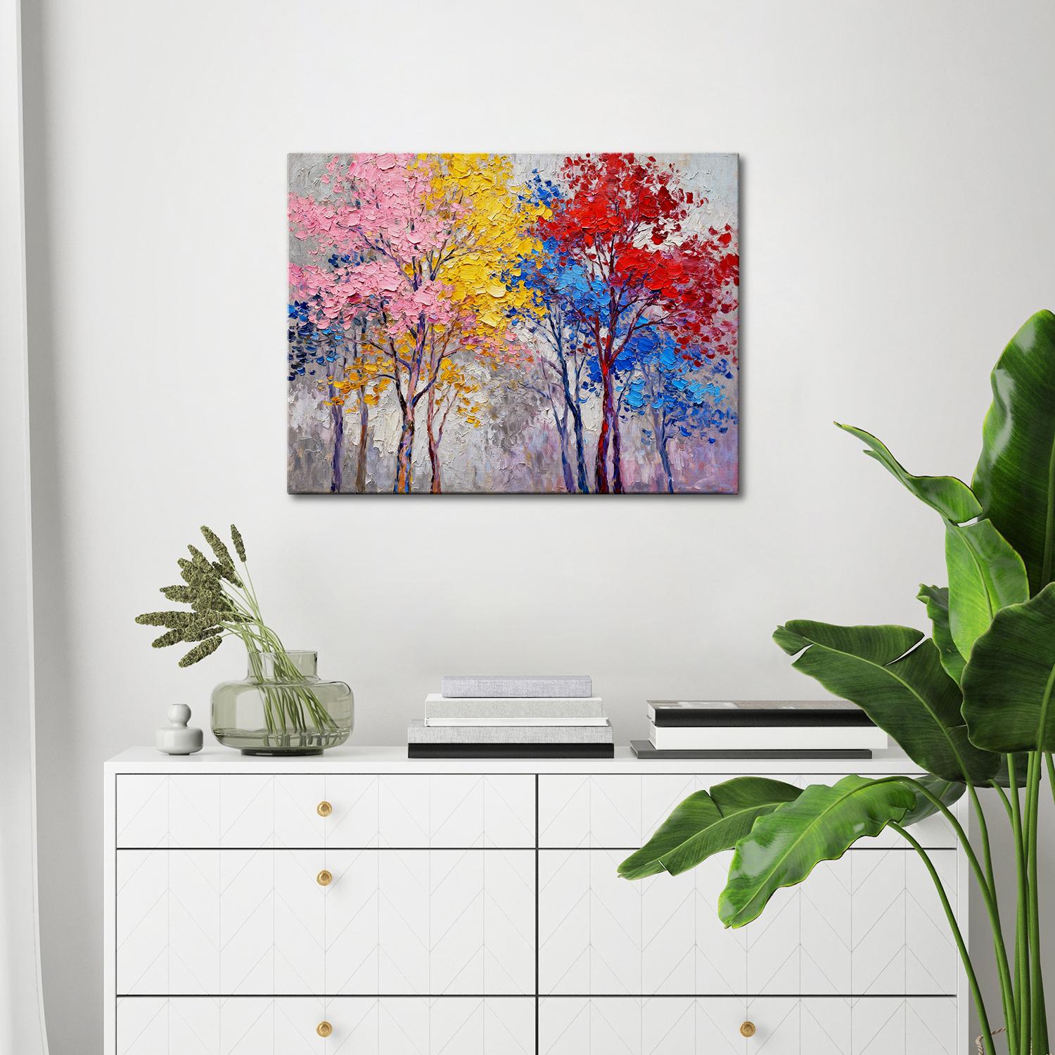 wall art painting above the table depicting colorful forest