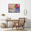 black frame wall art painting depicting colorful forest