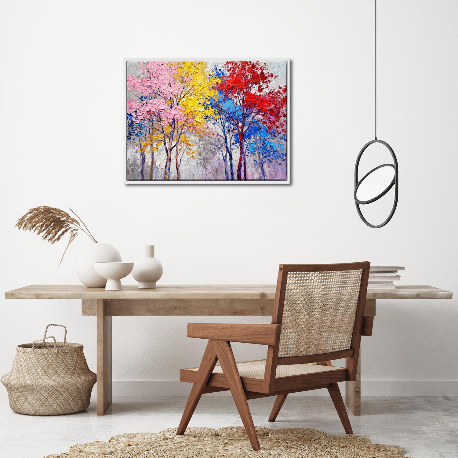 white frame wall art painting depicting colorful forest