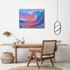 gold frame wall art painting above the table depicts the magnificent scene of colorful waves surging.