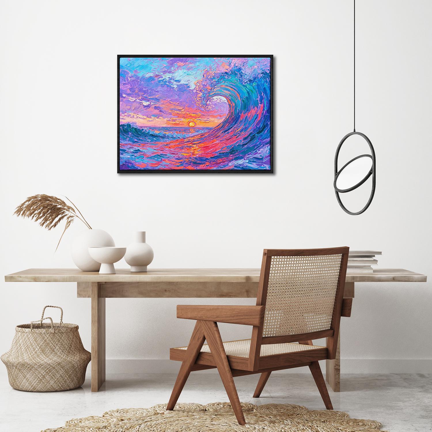black frame wall art painting above the table depicts the magnificent scene of colorful waves surging.
