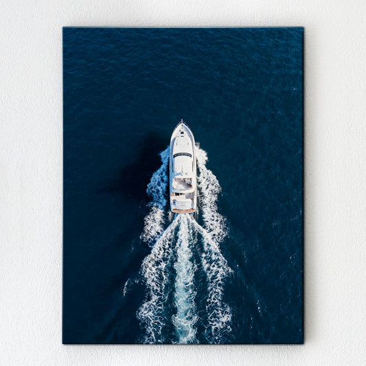 wall art canvas depicts a white yacht sails on the deep blue sea