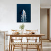 wall art canvas in the dining room depicts a white yacht sails on the deep blue sea