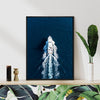 black frame wall art canvas depicts a white yacht sails on the deep blue sea