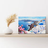 wall art canvas on the table depicts santorini scenery
