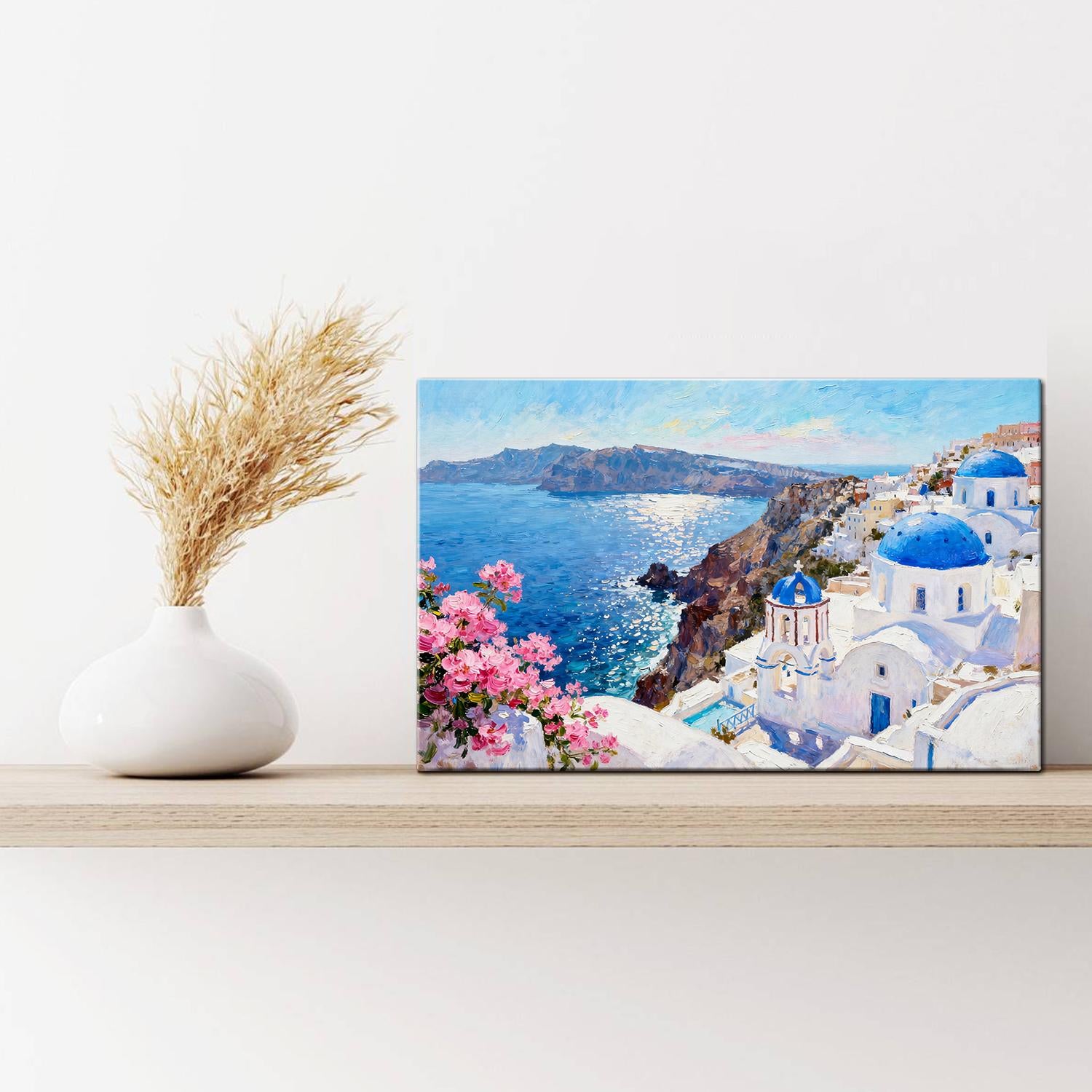 wall art canvas on the table depicts santorini scenery