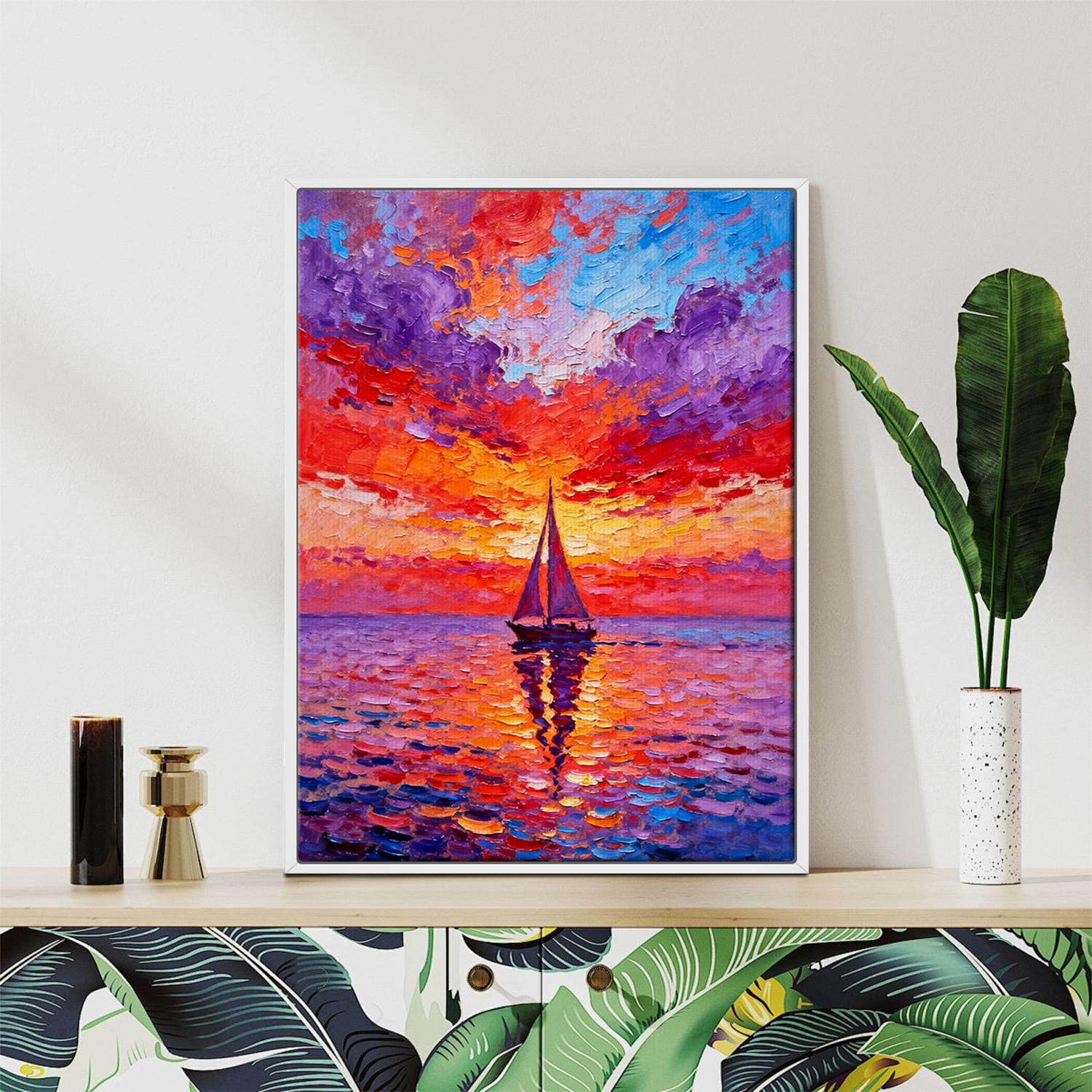white frame wall art painting depicts the beautiful scenery of a sailboat sailing on the sea dyed by the gorgeous sunset.