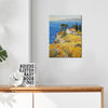 wall art painting hang on the wall depicting a cliffside cottage by the sea