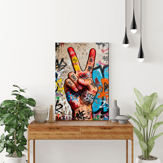 wall art painting victory gesture on the table