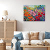 wall art canvas painting in the living room depicts a colorful sea of flowers