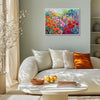 white frame wall art canvas painting depicts a colorful sea of flowers