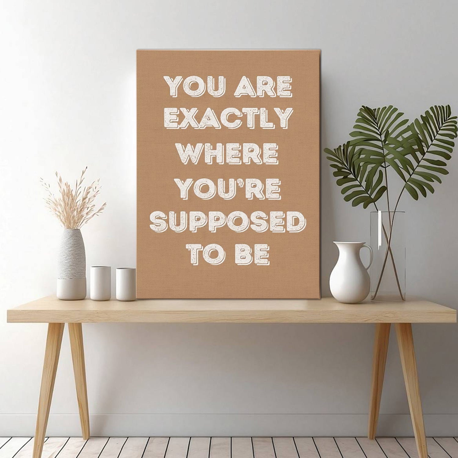 motivational poster wall art canvas on the table