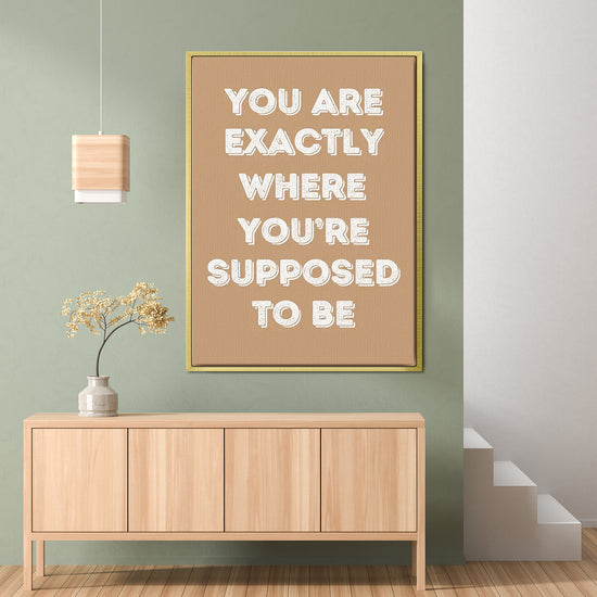 gold frame motivational poster canvas print hanging on the wall
