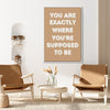 white frame motivational poster canvas print hanging on the wall