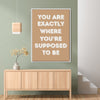 white frame motivational poster canvas print hanging on the wall
