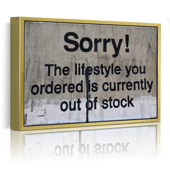 gold frame banksys statement canvas print