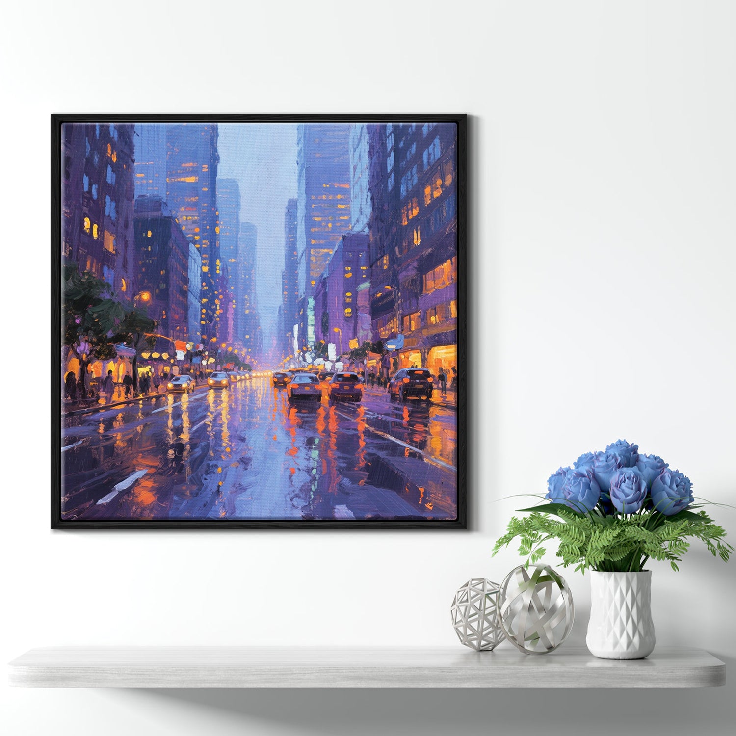 a black frame wall art painting showing the bustling city streets on a rainy night hangs on the wall of a warmly decorated room