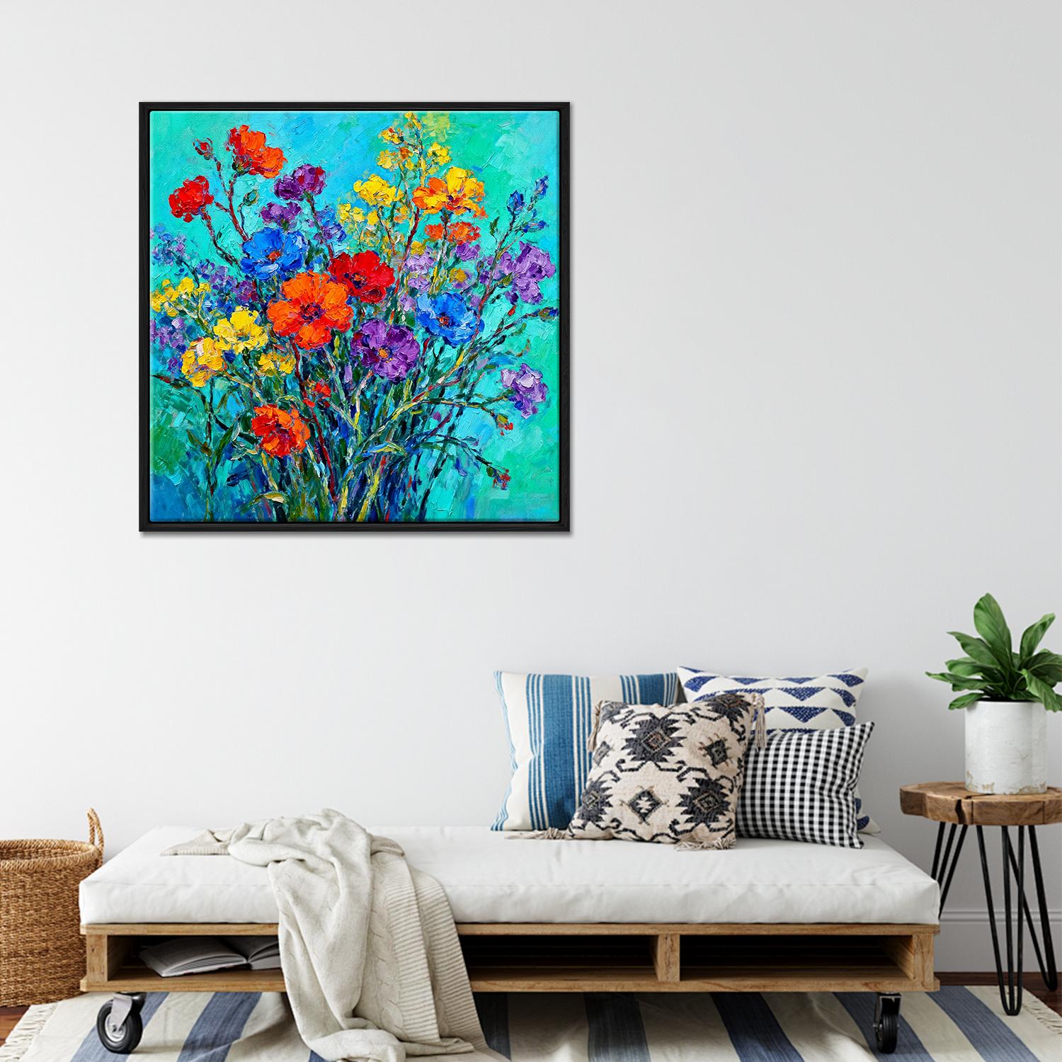 black frame wall art canvas painting depicts a gorgeous and colorful bouquet of flowers.