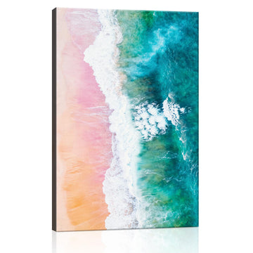wall art canvas depicts pink sand beach and white waves