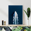 white frame wall art canvas depicts a white yacht sails on the deep blue sea