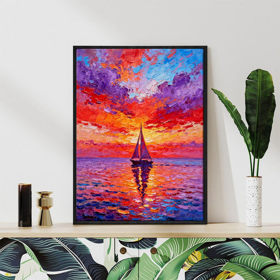 black frame wall art painting depicts the beautiful scenery of a sailboat sailing on the sea dyed by the gorgeous sunset.